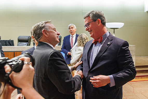 Mayor John Dailey and FSU President McCullough shake hands 