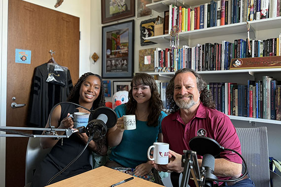 Florida State University Professor of Art Therapy and director of the Institute for Arts & Art Therapy with the Imprisoned Dave Gussak, right, poses with art therapy graduate students Malea Burroughs, left, and Sydney Nichols, producers of the new podcast “Creativity Unconfined,” in Gussak’s office